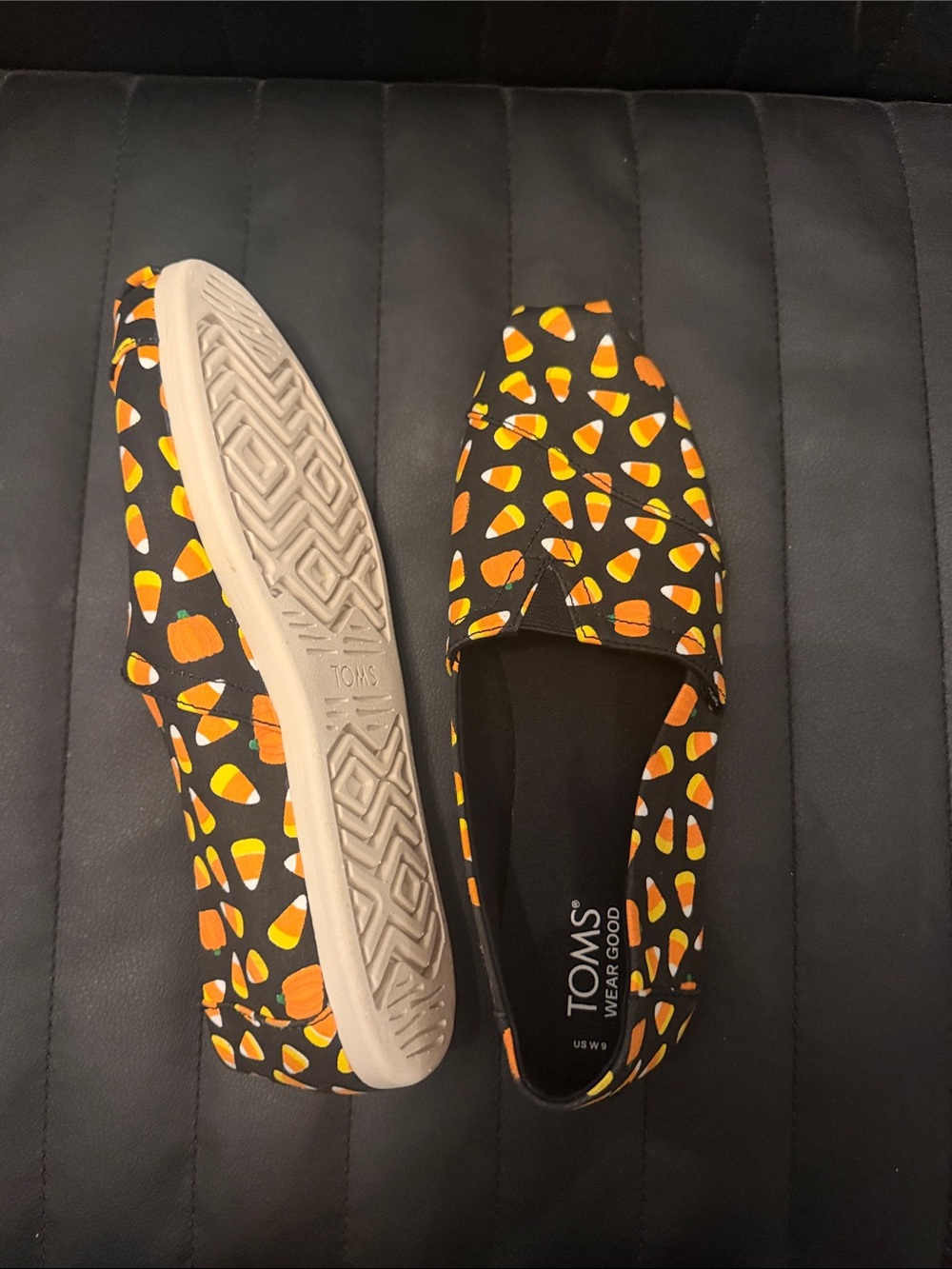 Toms Black Canvas Slip-Ons with Candy Corn Print
